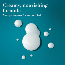 OGX creamy coconut milk texture close-up showing moisturized feel