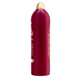 OGX bottle beside matching shampoo for a complete smoothing routine