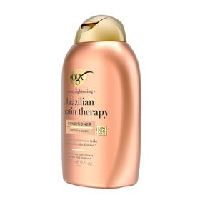 OGX conditioner applied while combing to show detangling and manageability