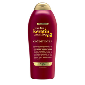 OGX front packaging showing the smoothing oil conditioner and benefit of frizz control
