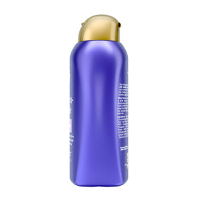 OGX being applied to wet hair showing even tone coverage and ease