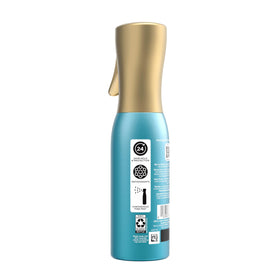OGX paraben-free badge next to bottle for cleaner formulation
