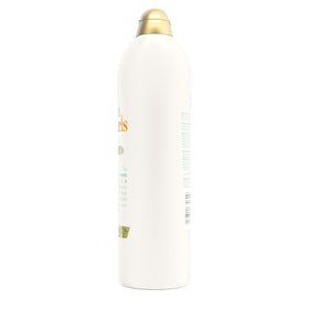 OGX bottle next to common items to show 25.4 fl oz size and value