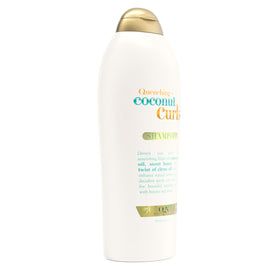 OGX close-up of wet curl texture showing enhanced definition and shine