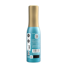 OGX 6.5 fl oz bottle in a purse showing travel convenience