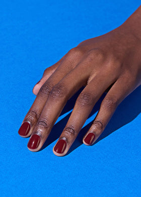 ohora strips on fingers before curing demonstrating simple adhesion process