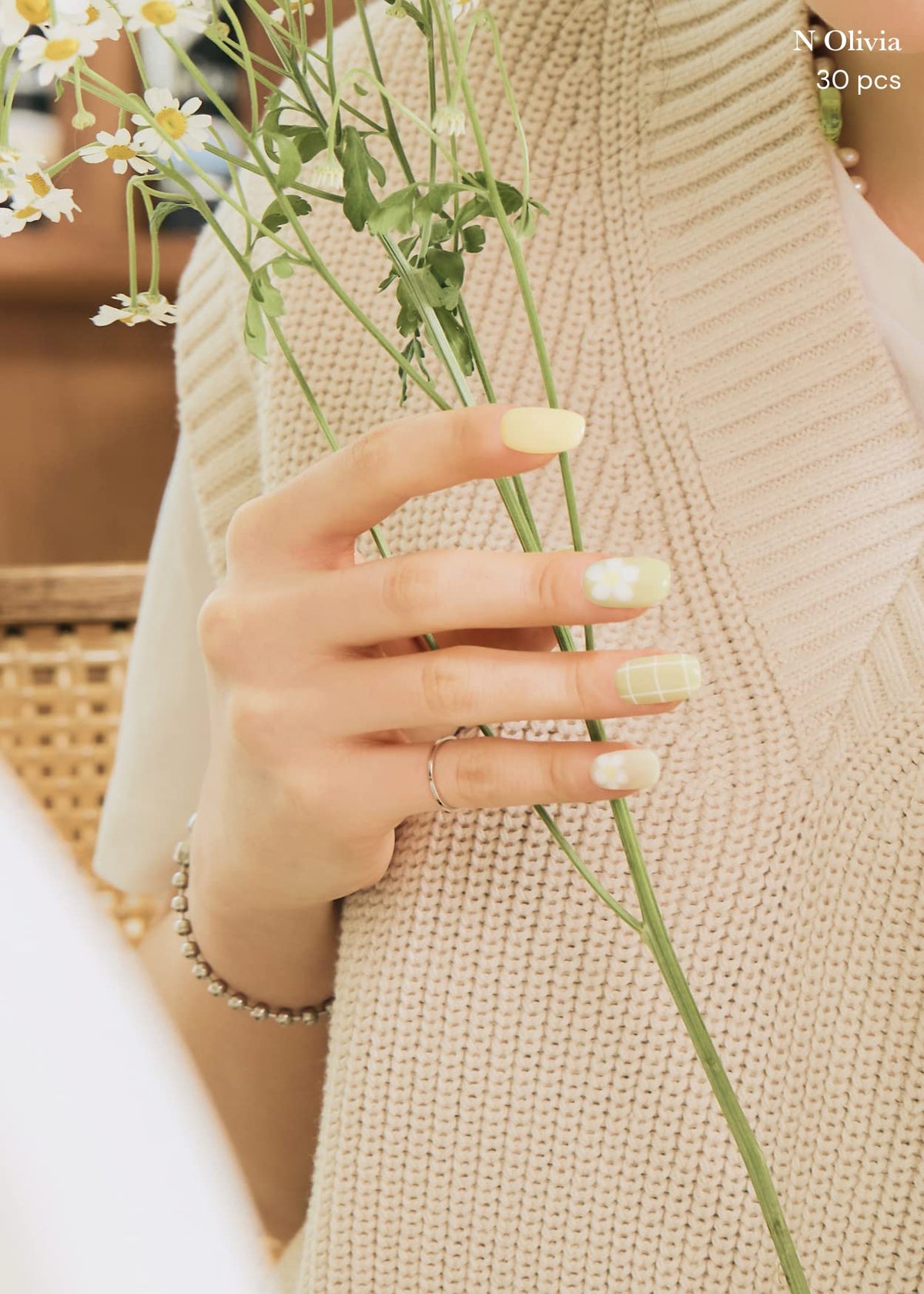 ohora on natural hands styled in lifestyle scene showing durable, glossy finish