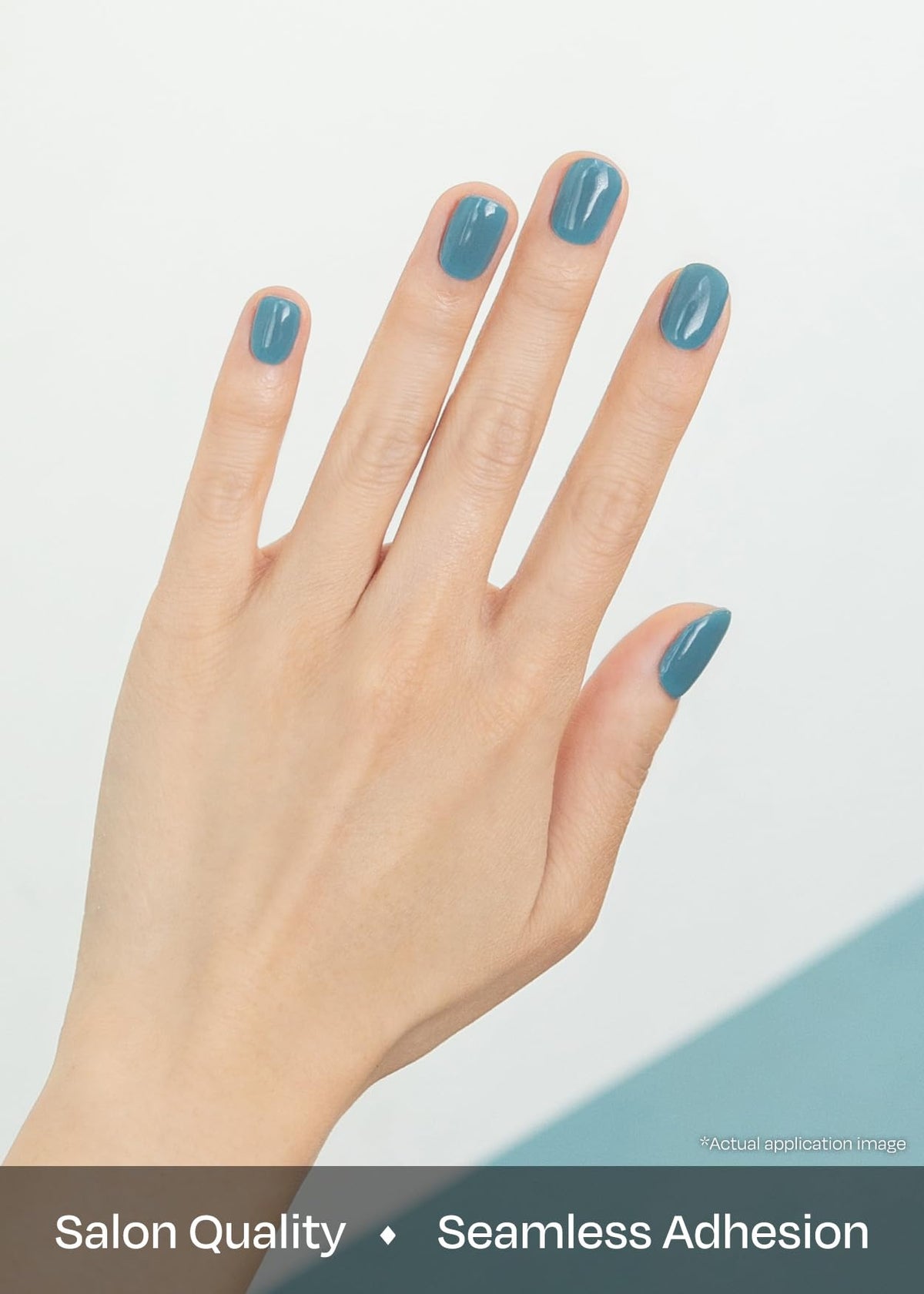 ohora hand applying strip with wooden stick for easy at-home mani benefit