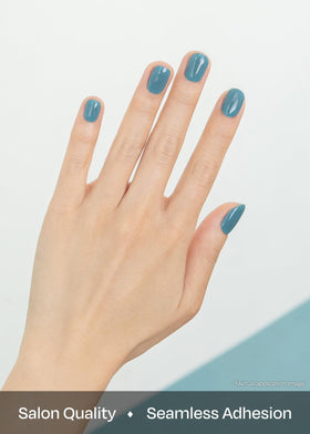 ohora hand applying strip with wooden stick for easy at-home mani benefit