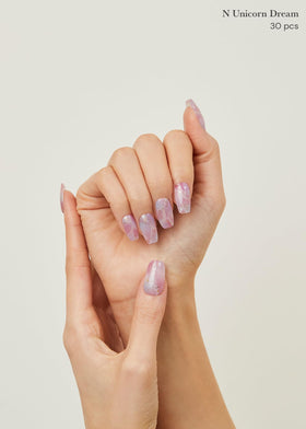 ohora finished manicure on hand in lifestyle setting benefit: salon-quality look at home
