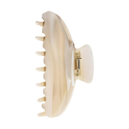 OideGuiing front view of creme clip showing shape and polished finish, durable hold