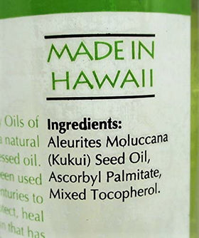 Oils of Aloha warmed oil on hands ready for scalp treatment soothing dryness