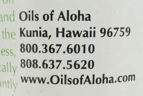 Oils of Aloha bottle next to common items showing 4 fl oz scale