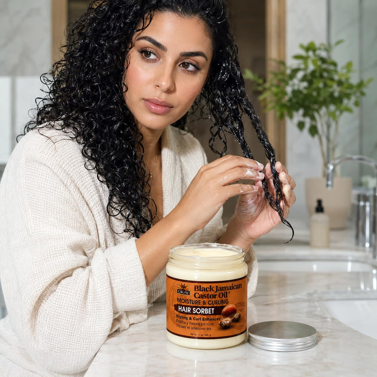 OKAY 17 oz jar in hand for size and portion context