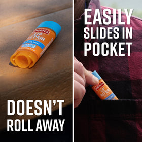 O'Keeffe's cooling relief stick beside travel items for on-the-go lip care convenience