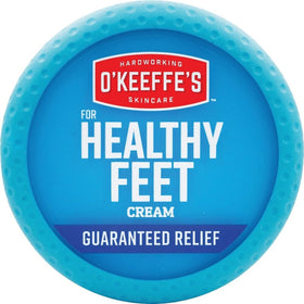 O'Keeffe's jar next to hand showing scale benefit: travel-friendly size