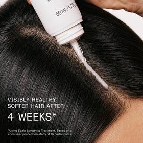 Olaplex N°0.5 serum on scalp being applied to promote visible softness