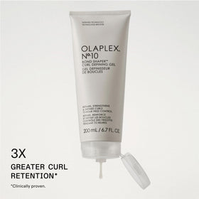 Olaplex Nº.10 pump dispensing gel demonstrating easy application and controlled amount