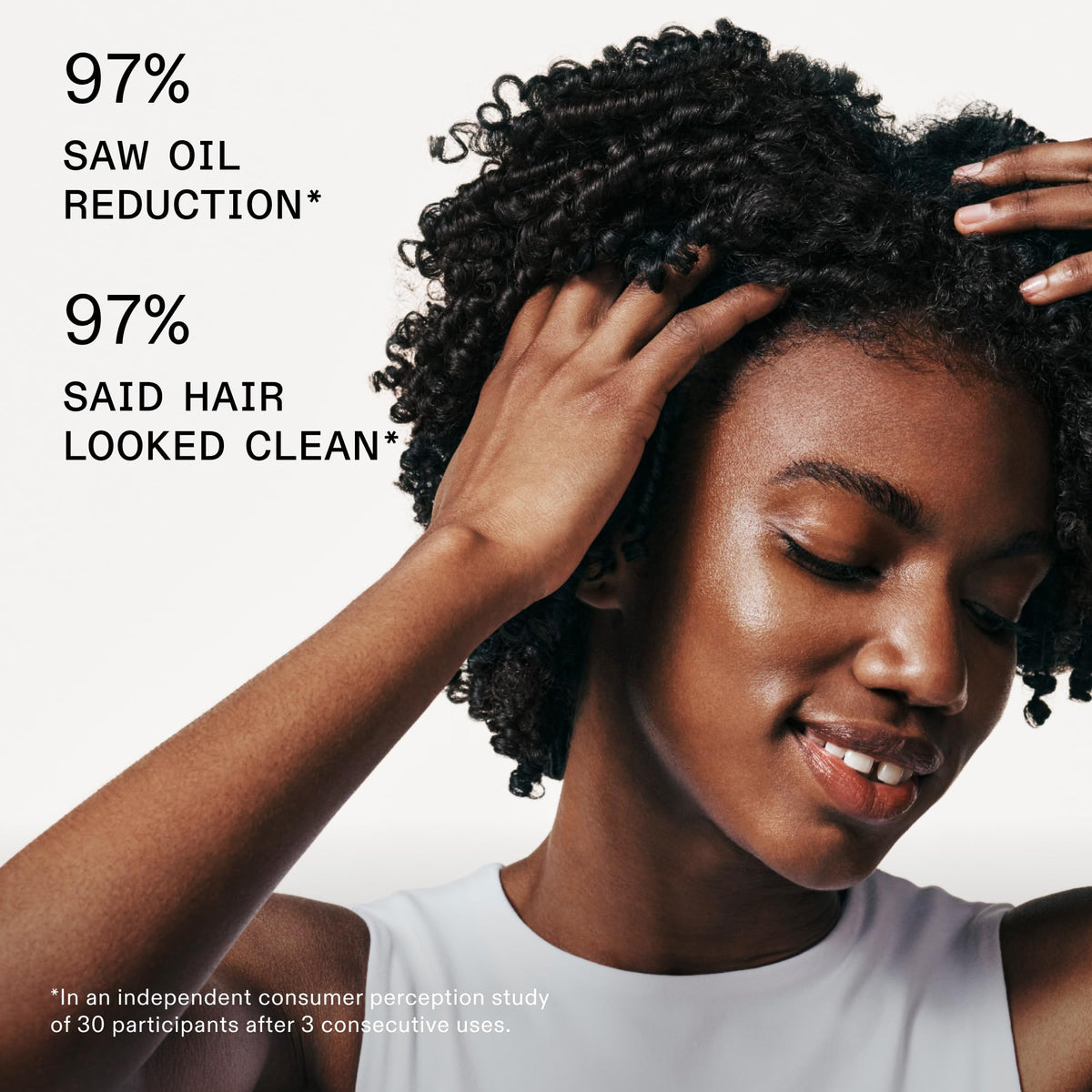Olaplex Nº.4D spraying roots to demonstrate oil absorption and instant refresh