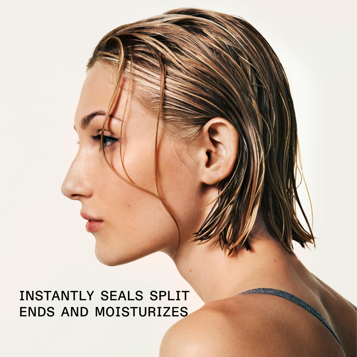 Olaplex Nº.5 being applied to damp hair to detangle and protect during styling