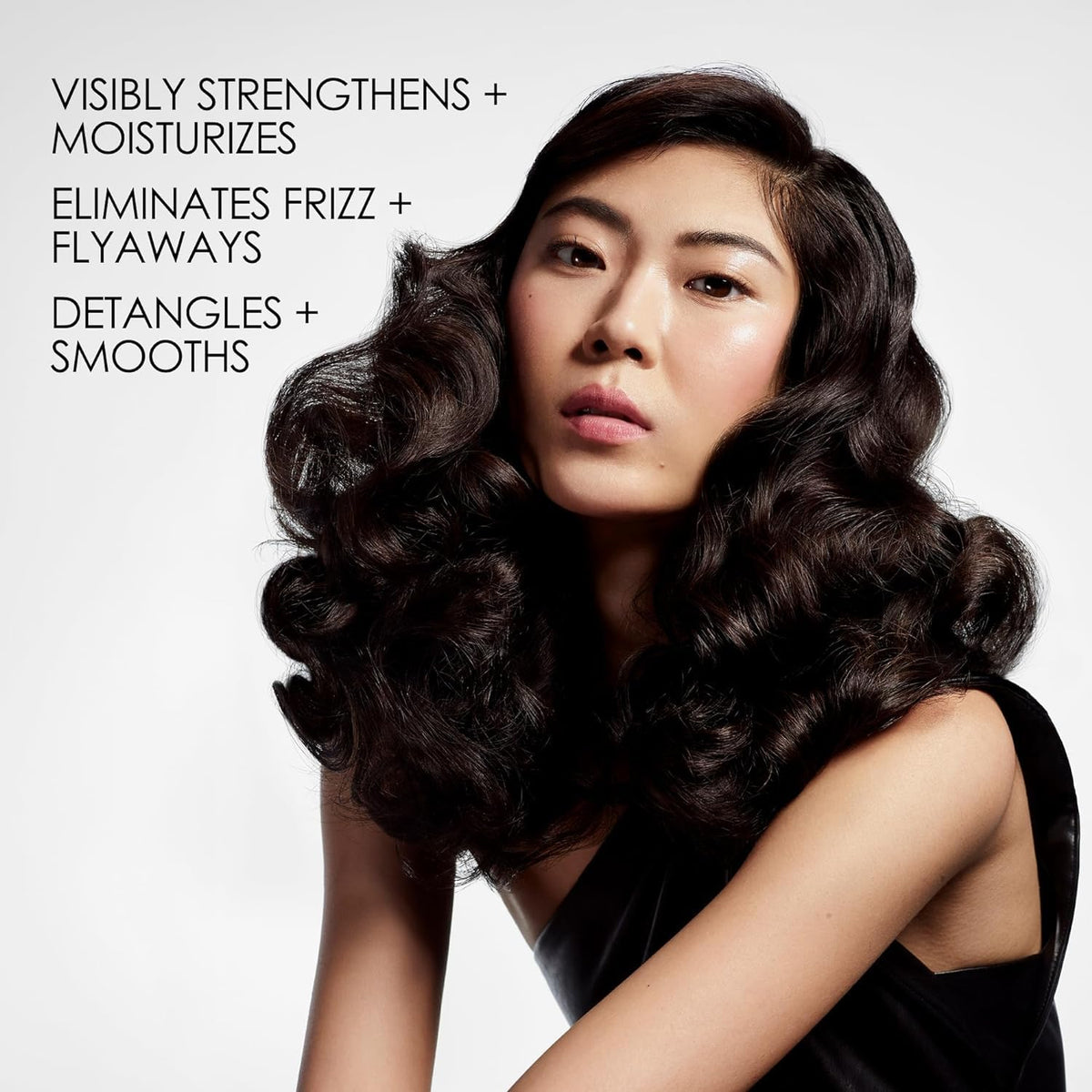 Olaplex Nº.5 pump dispenser close-up for easy professional dispensing benefit