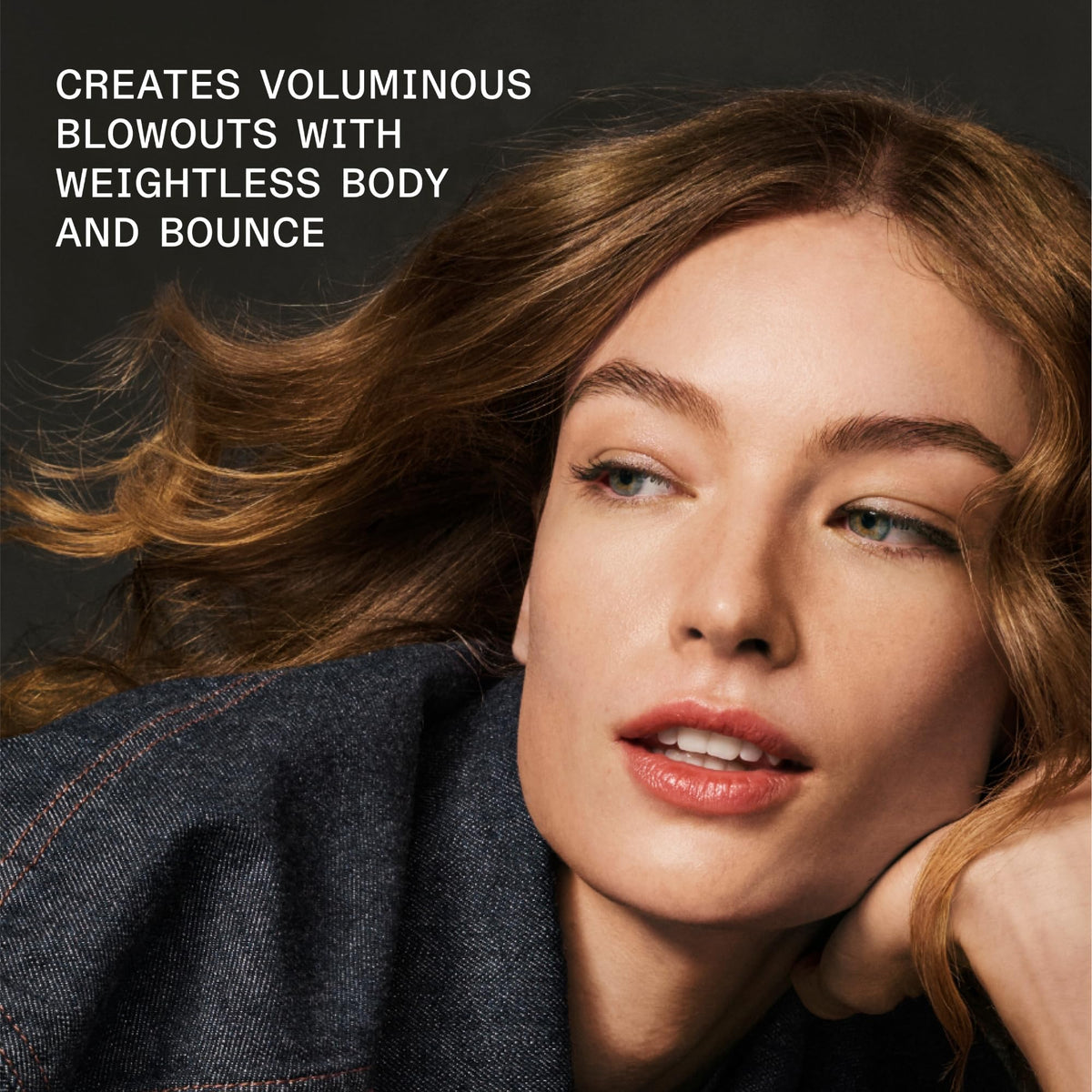 Olaplex product texture on damp hair illustrating lightweight feel and shine