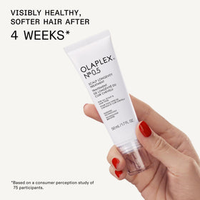 Olaplex travel kit packed inside a carry-on showing on-the-go convenience