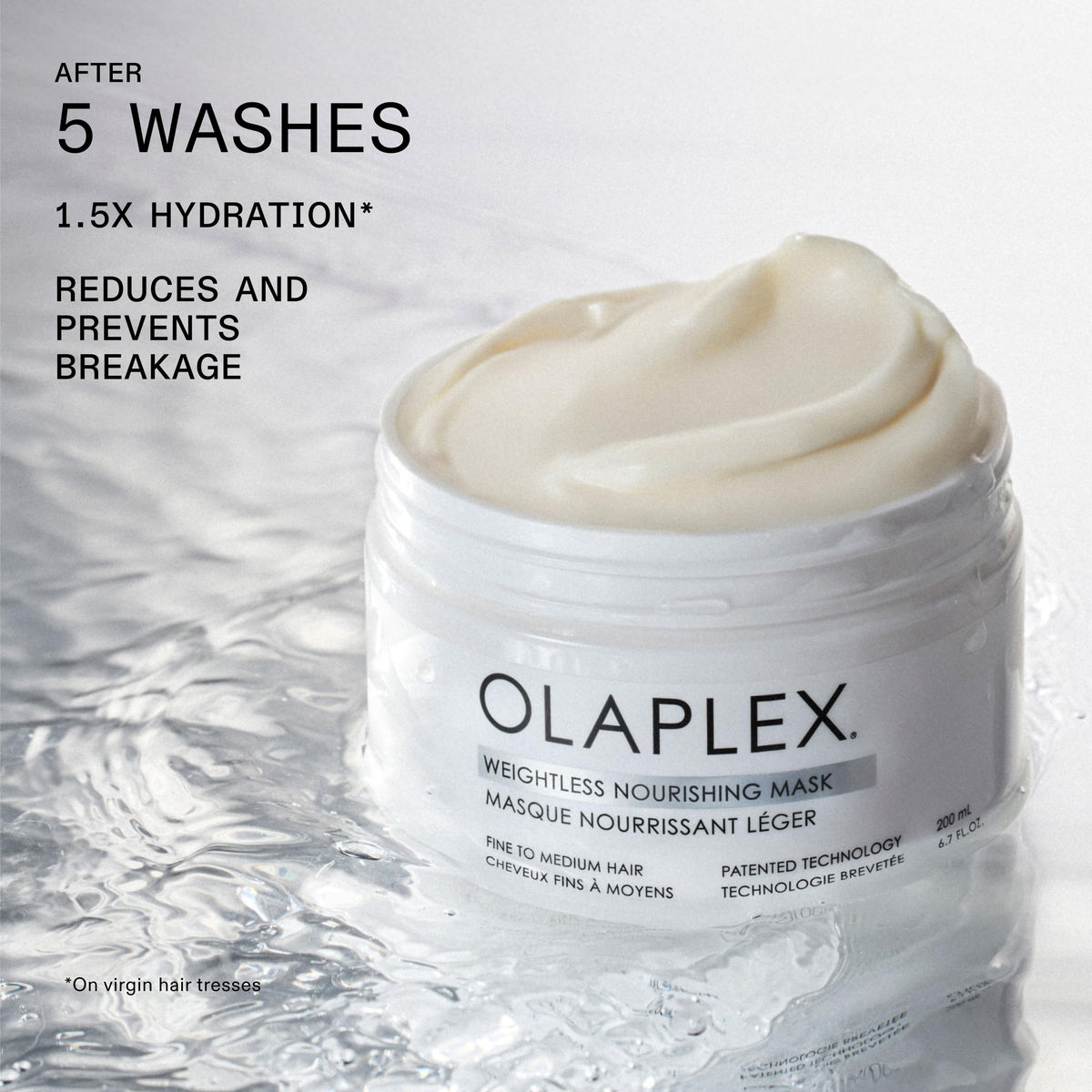 Olaplex mask being dispensed into hand for easy application benefit