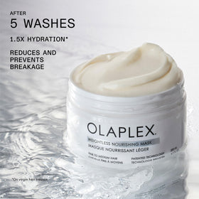 Olaplex mask being dispensed into hand for easy application benefit