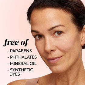 Olay being applied under foundation illustrating non-greasy layering benefit