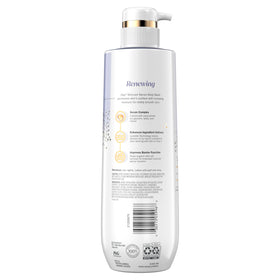 Olay body wash held next to hand to show 17.9 fl oz scale