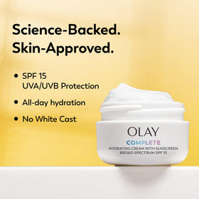 Olay cream being applied to hand for smooth hydration benefit