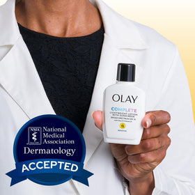 Procter & Gamble Olay Complete lotion blended on skin demonstrating no white cast