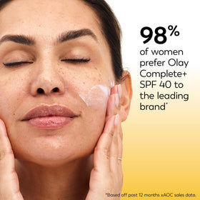 Olay Complete+ on bathroom counter as part of everyday skincare routine