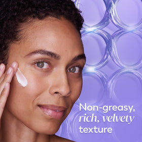 Olay cream being applied to hand demonstrating quick absorption