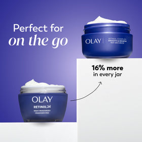Olay cream on fingers ready to apply showing smooth application benefit