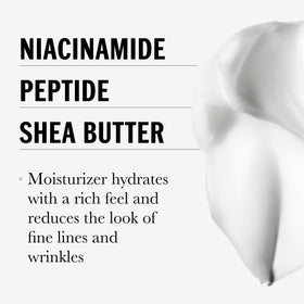 Olay cream on fingers ready to apply, demonstrating smooth spreadability