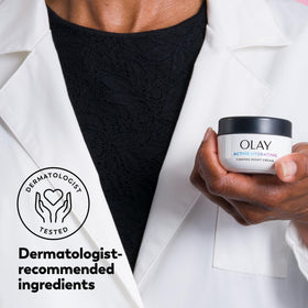 Close-up of Olay firming night cream lid detail indicating quality packaging benefit