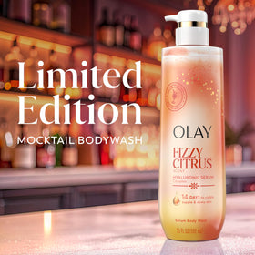 Olay bottle styled with mandarin and freesia to show scent profile benefit