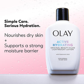 Olay fluid lotion spread on skin showing lightweight absorption benefit