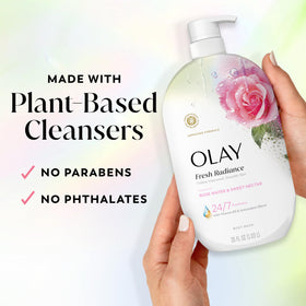 Dollop of Olay body wash on hand showing silky texture and spreadability