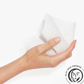 Olay cloth removing makeup from face showing effective cleansing benefit