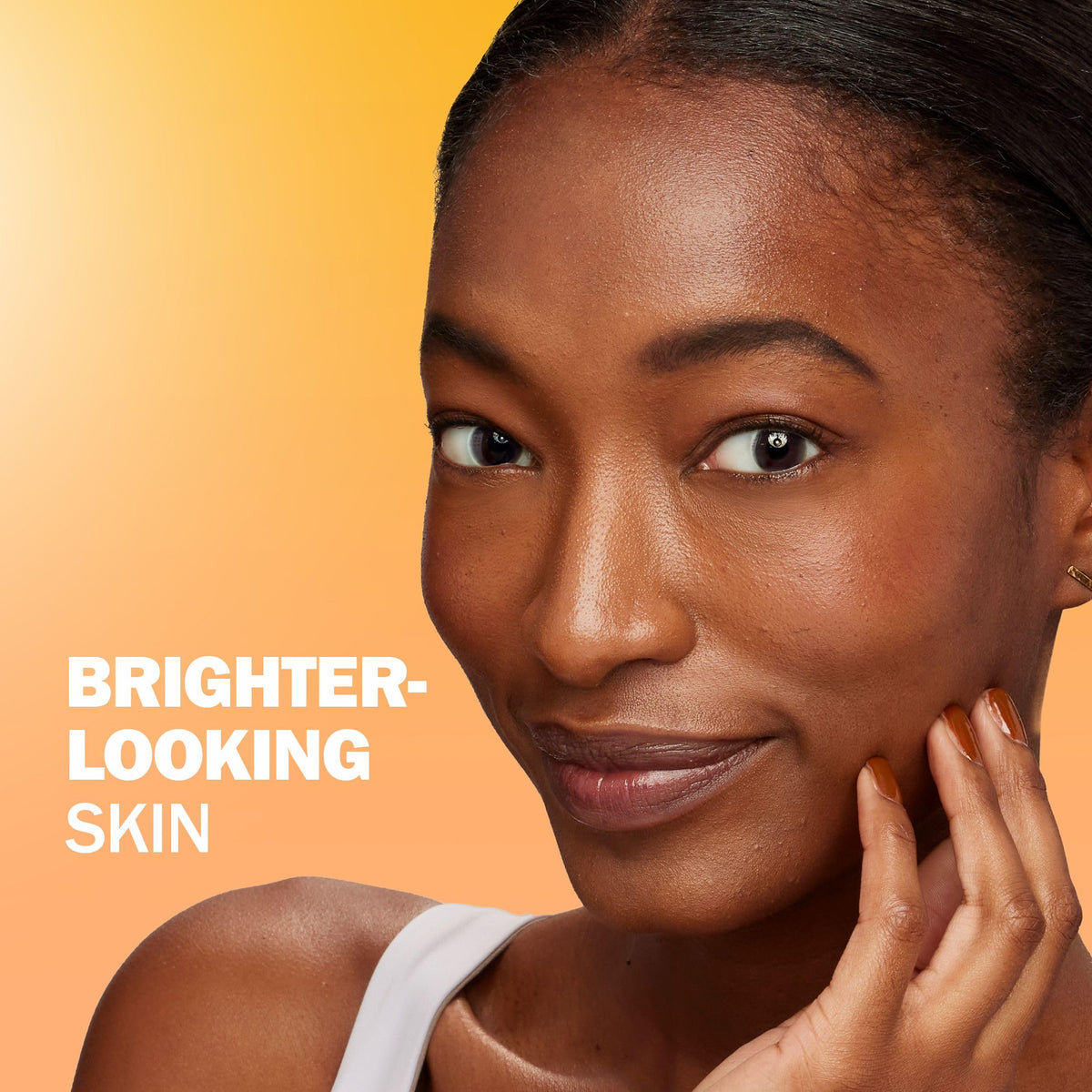 Olay ingredient display highlighting vitamin C and peptides for brighter skin