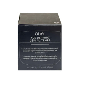Open Olay jar revealing cream inside for easy scoop and application