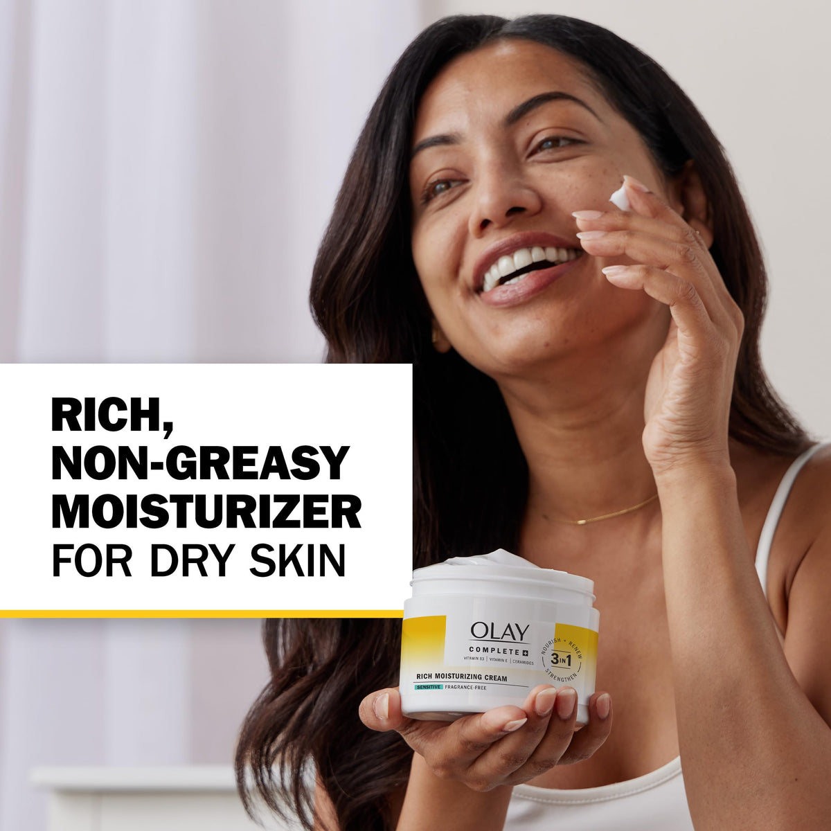 Olay cream beside common items for size comparison and easy dosing