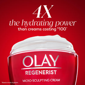 Olay Regenerist cream on spoon displaying rich consistency that boosts moisture retention