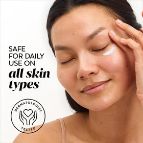 Olay 0.5 fl oz jar in hand showing compact travel-friendly size