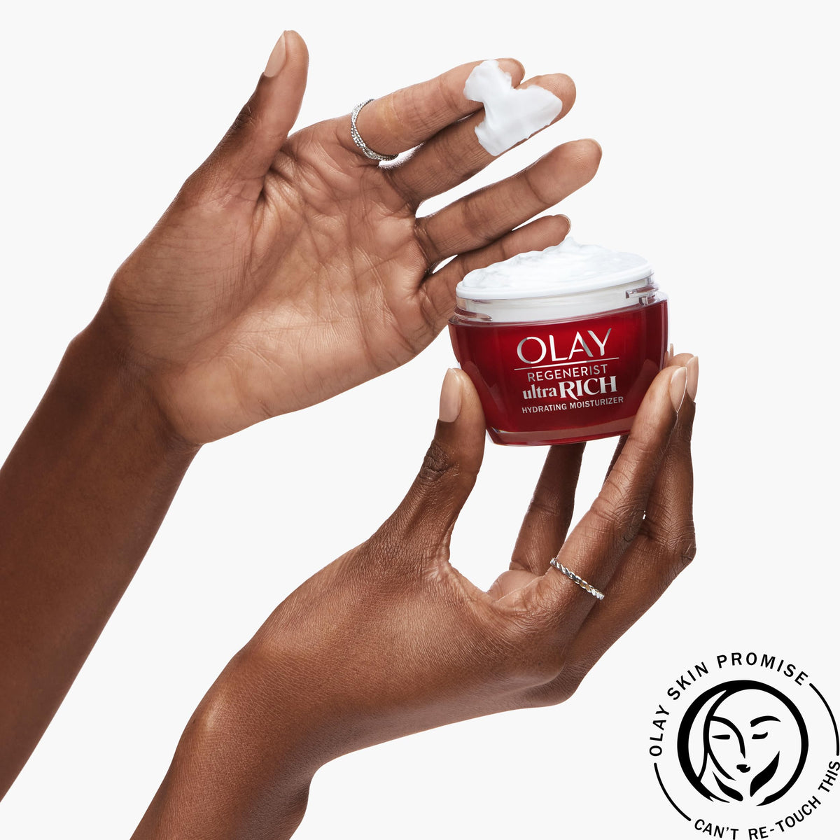 Visual of peptides and vitamin B3 next to Olay jar underscoring renewal benefits