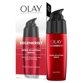 Olay woman applying serum in morning skincare routine