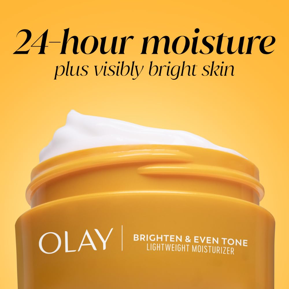 Olay application on model cheek showing even coverage and glowing effect